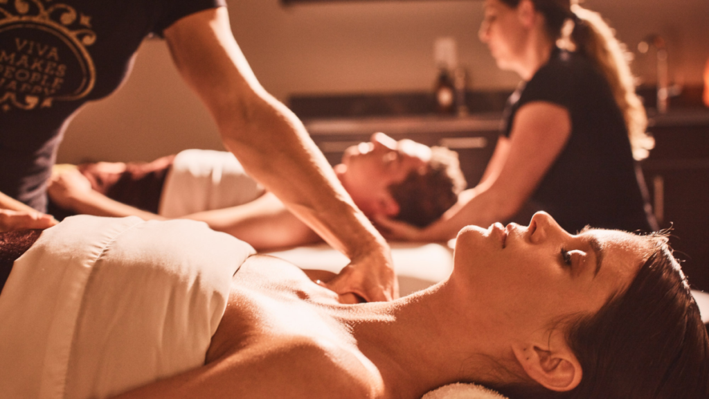 Couples massage in Austin, with soft lighting and peaceful relaxation.